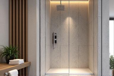 Baño elegante con ducha a ras de suelo y azulejos modernos.